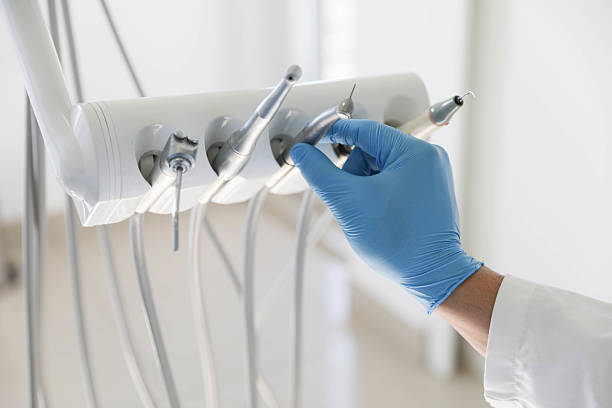 Professional Tooth Extraction technician working in St. Louis Park, MN
